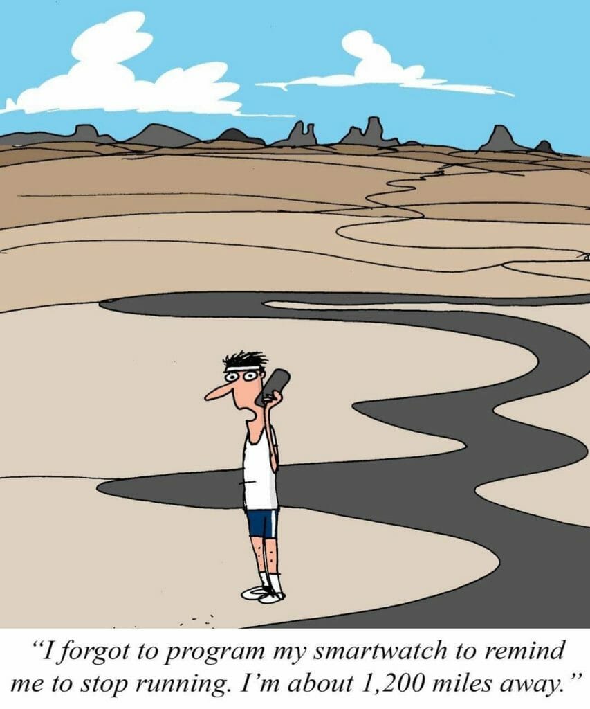 Cartoon of a man in running clothes standing confused in a desert with a winding road behind him, holding a phone saying he forgot to program his smartwatch to remind him to stop running.