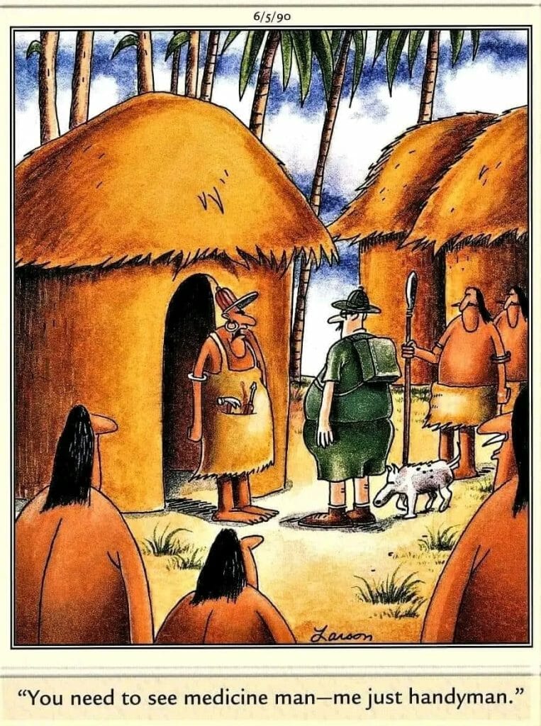 Cartoon of a handyman speaking to a group in a tribal village setting, explaining he is not a medicine man.