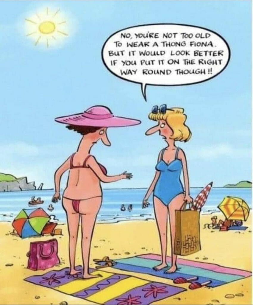 Cartoon of two women on a beach; one wearing a bikini bottom backwards, the other giving fashion advice.