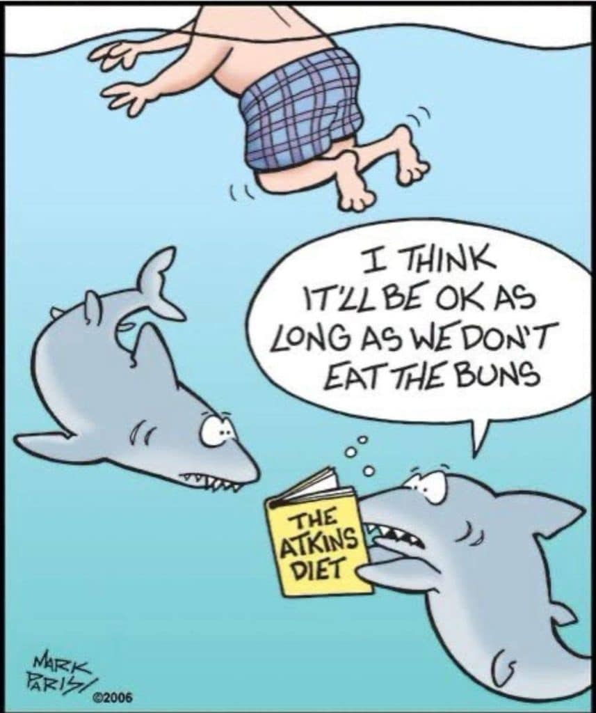 Cartoon of two sharks underwater looking worried as one reads a book titled 'The Atkins Diet' while a swimmer floats nearby.