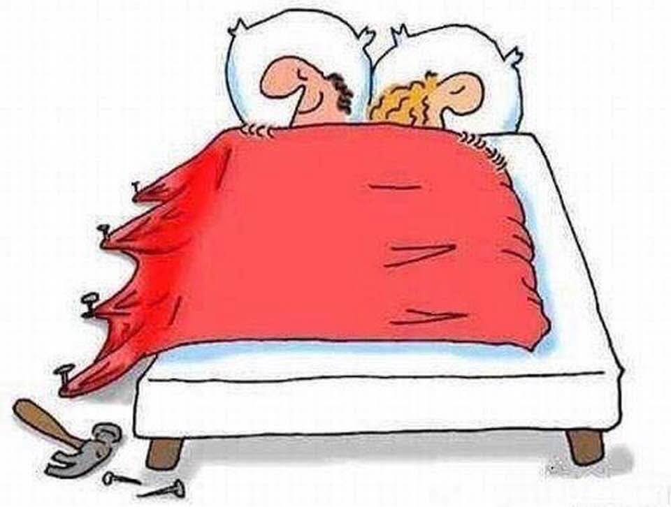Cartoon of a couple lying in bed under a red blanket, with one side shredded and nails pulled from the bed frame by a hammer on the floor.