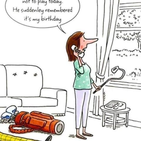 A woman standing inside a living room, holding a phone and a golf club, while a man lies on the floor with his legs out, next to a golf bag; the woman speaks in a bubble saying the golfer decided not to play because it's her birthday.