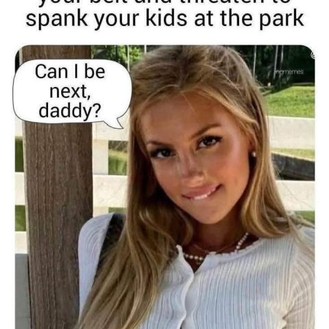 Young woman with long blonde hair and a white top, leaning slightly and smiling while biting her lip, with a speech bubble saying 'Can I be next, daddy?'. Text above reads, 'When she sees you pull off your belt and threaten to spank your kids at the park'.