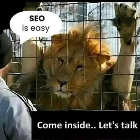 A lion behind a cage bars with one paw raised and a speech bubble saying 'SEO is easy', facing a person outside the cage. Text below says 'Come inside.. Let's talk'.