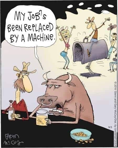 A tired-looking cow sitting at a bar holding a drink says his job was replaced by a machine while a cowboy rides a mechanical bull and people cheer in the background.