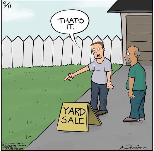 Two men stand next to a yard sale sign in front of a white picket fence and lawn; one man points at the grass saying 'That's it.'