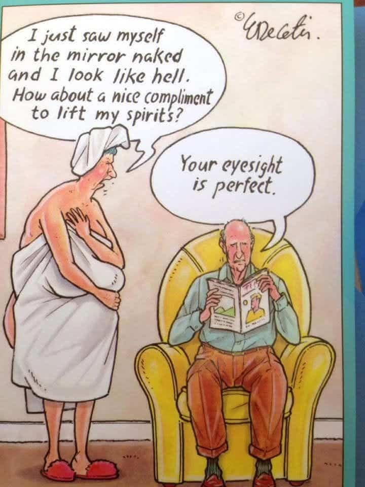 An elderly woman in a towel talks to an elderly man seated in a yellow armchair holding a magazine. The woman says she looks terrible naked and asks for a compliment, the man replies her eyesight is perfect.