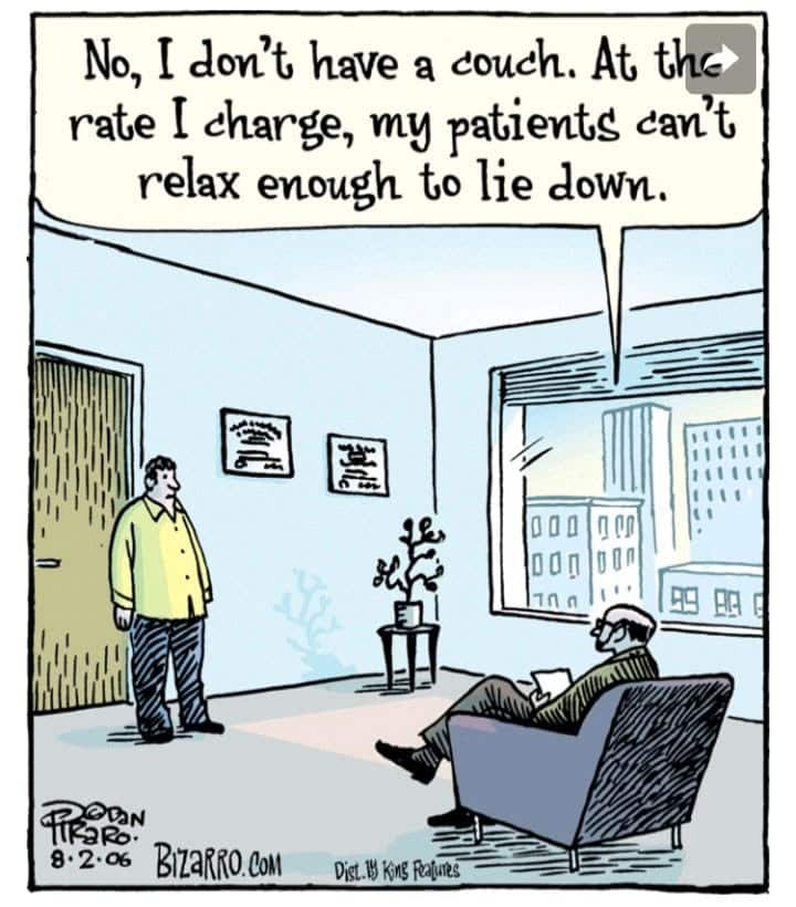 A man standing in a therapist's office talking to a seated therapist who says, 'No, I don't have a couch. At the rate I charge, my patients can't relax enough to lie down.'