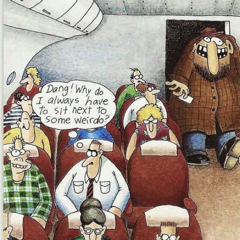 Inside an airplane cabin, a man in a suit seated among other passengers thinks: 'Dang! Why do I always have to sit next to some weirdo?' A large, oddly dressed passenger with a big nose stands near the entrance to the cabin.