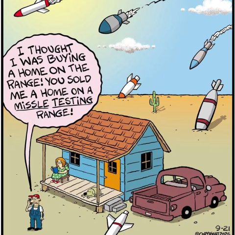 Man standing outside a blue house with a woman on the porch and missiles flying and crashing around them in a desert.