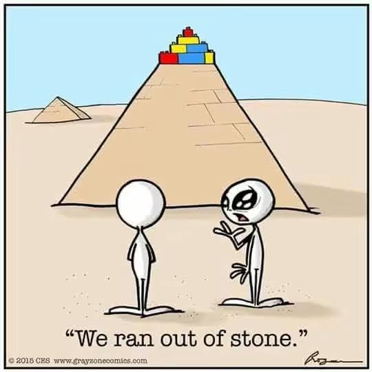 Two aliens in front of a pyramid made from LEGO blocks on top, one alien gesturing as if explaining, with text saying 'We ran out of stone.'