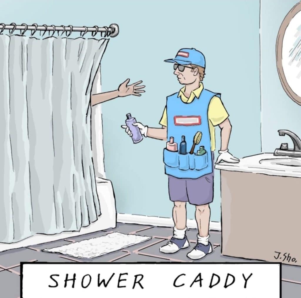 A man wearing a vest with pockets full of toiletries standing beside a shower curtain, handing a bottle to a hand coming out from inside the shower.