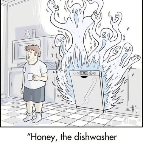 A man in casual home clothes holding a mug looks away while a dishwasher emits blue flames and ghostly figures with screaming faces from it in a kitchen.
