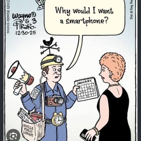 A man wearing various old-fashioned gadgets on his body and holding a calendar, talking to a woman holding a smartphone.