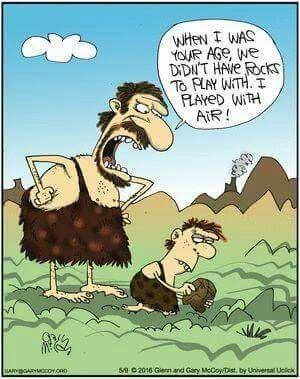 A caveman father lecturing his son who is inspecting a rock, claiming they played with air when he was young.