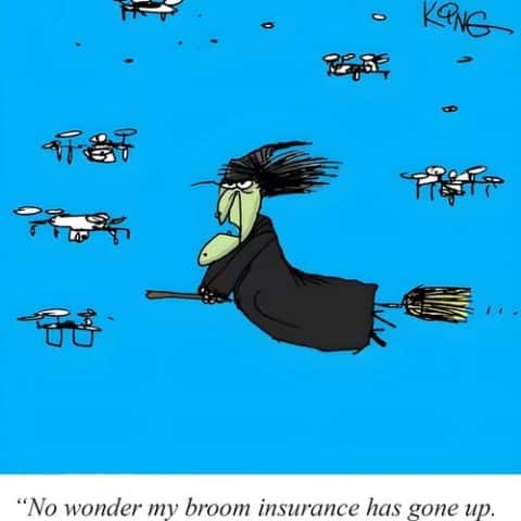 A cartoon witch flying on a broomstick with an annoyed expression surrounded by multiple drones in a blue sky.